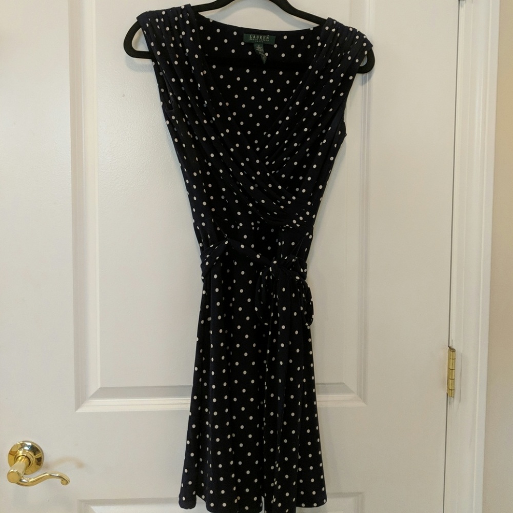 Navy polka dot faux wrap dress